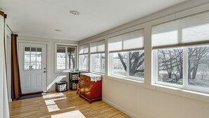 A room with a wooden floor, a red dresser, and large windows with blinds. - 18-Acre Working Farm w/ Mtn Views! Dolores Escape (Dolores)