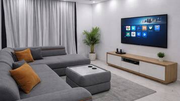 Appartement Supérieur, balcon, vue piscine | Coin séjour