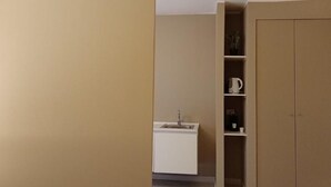 A kitchen with a sink, cabinets, and a countertop. - Narciso Boutique Apartment - room n3 (Acireale)