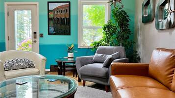 TV, fireplace, books, printers