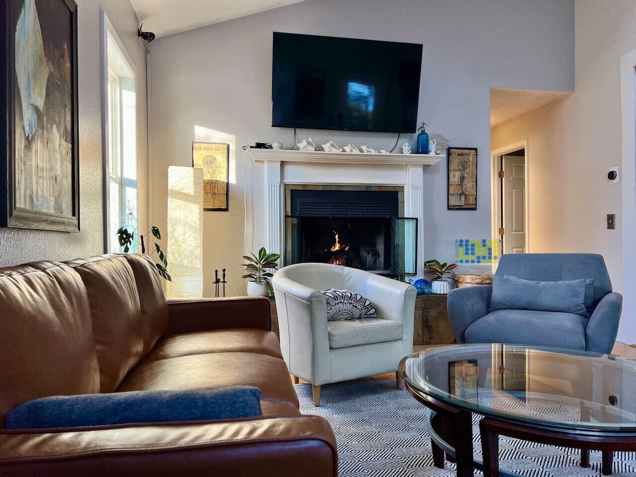 TV, fireplace, books, printers