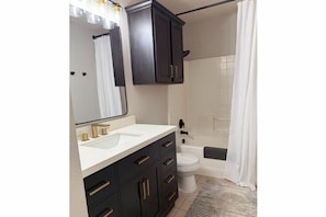 Hair dryer, towels, soap, toilet paper