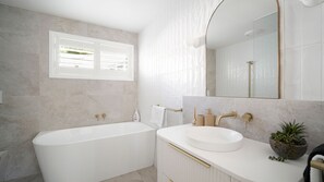 Shower, hair dryer, towels