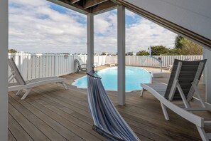 A heated pool - Why Knot | Pool, Elevator, Putting Green, Cabana Service & $250 Beach Gear Credit – Across from Beach Access (Holden Beach)