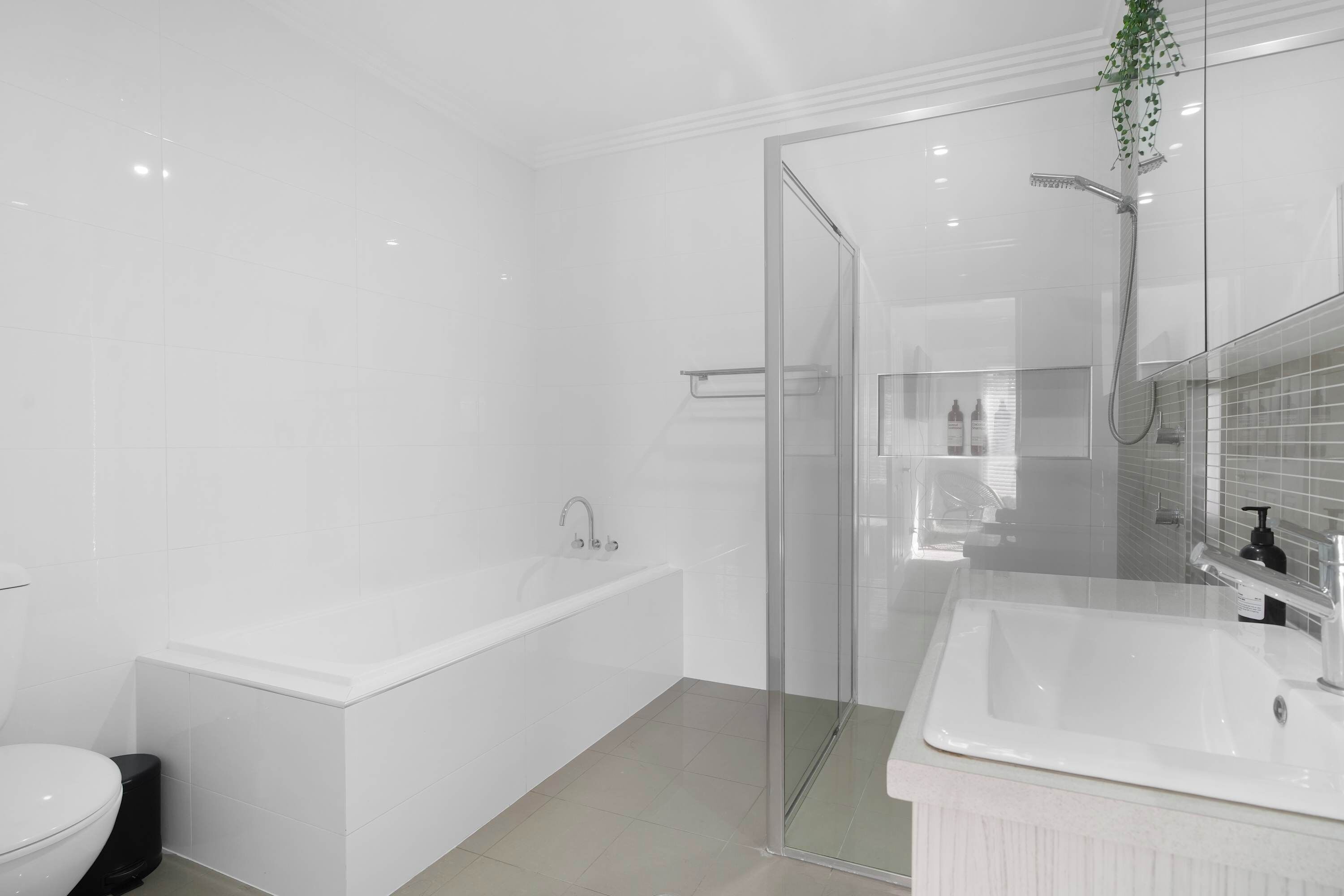 Shower, hair dryer, towels, shampoo