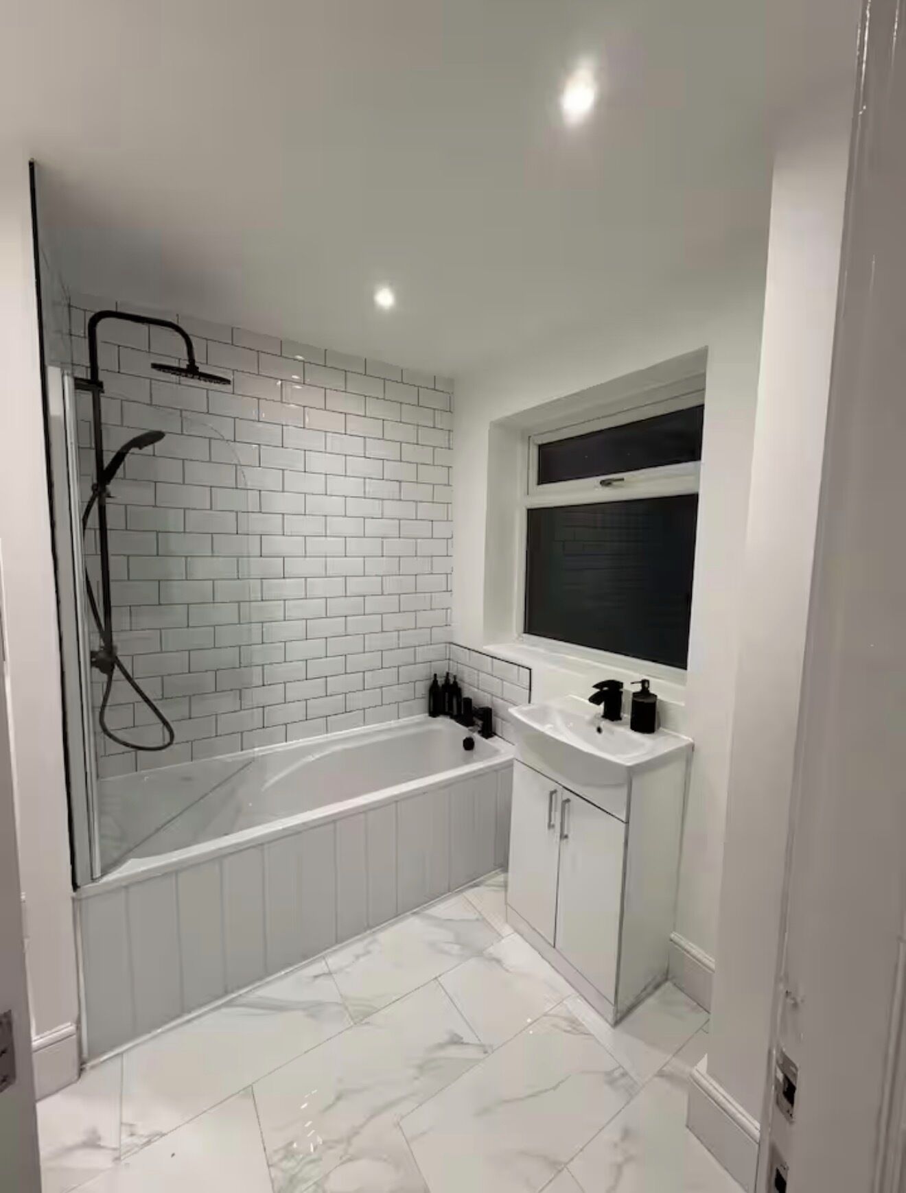 Shower, towels, soap, toilet paper