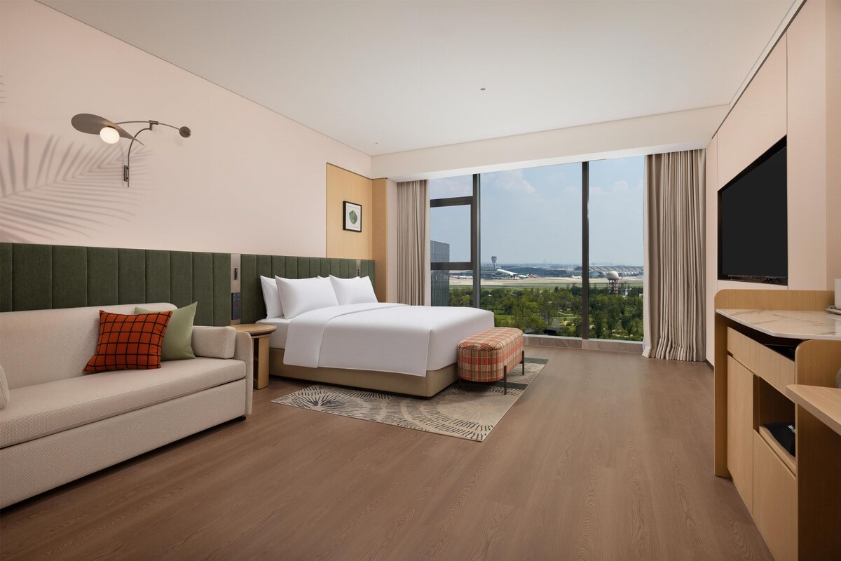 Room, 1 King Bed with Sofa bed | Living area | LCD TV