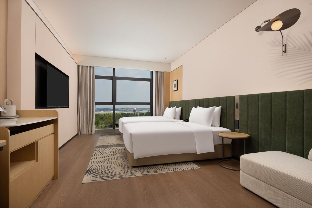Room, 2 Single Beds (Airport View) | Minibar, desk, laptop workspace, blackout curtains