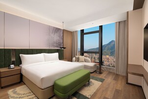 Deluxe Suite, 1 King Bed | Premium bedding, down comforters, memory foam beds, minibar
