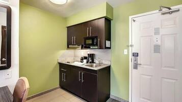 Fridge, microwave, stovetop, coffee/tea maker