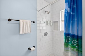 Shower, hair dryer, towels