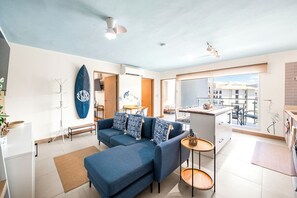 Smart TV, offices - Casago | Coastal Art Condo Near Jacó Beach (Jaco)