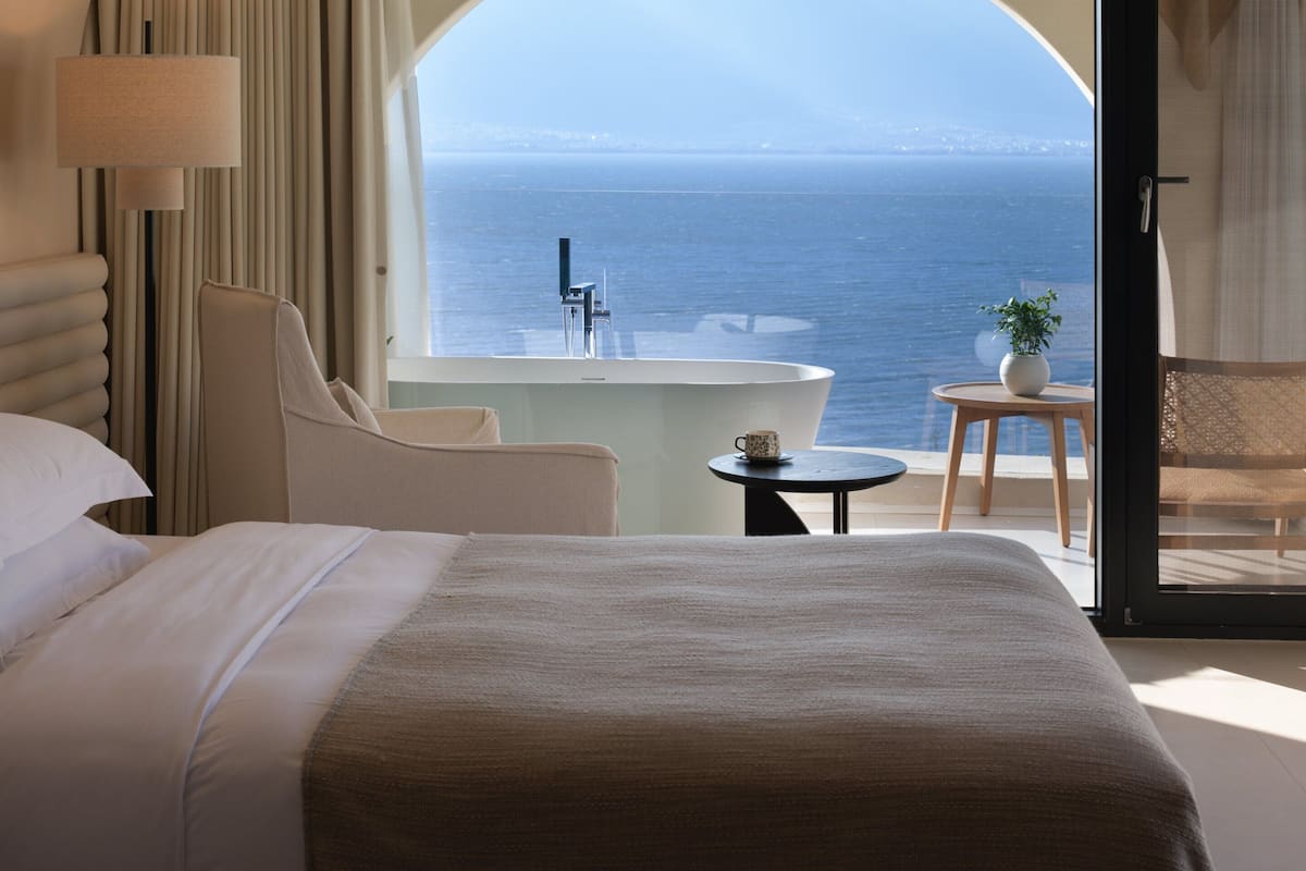 Habitación familiar con 2 camas individuales, balcón, vistas al mar