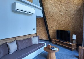 Vila standard, sacada, vista para o jardim | Área de estar