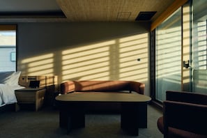 Deluxe-Zweibettzimmer | Wohnbereich