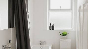 Hair dryer, towels, soap, shampoo