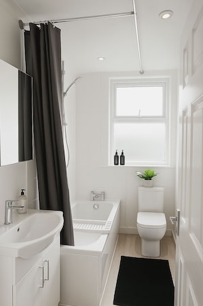 Hair dryer, towels, soap, shampoo