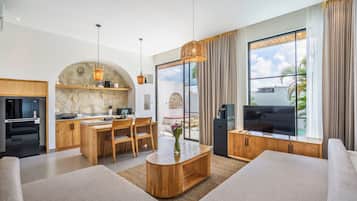 Superior Villa, Balcony, Pool View | Living area | 32-cm LED TV with cable channels