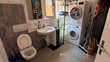 Hair dryer, towels, soap, toilet paper