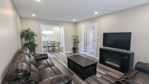 House, 5 Bedrooms, Fireplace | Living room - Doctor's Lounge - An Executive Home in Niagara (St. Catharines)