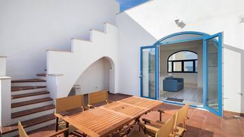 Appartement, uitzicht op zee | Buiten dineren