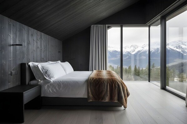 A modern bedroom with a large window, a bed, a bedside table, and a view of mountains.