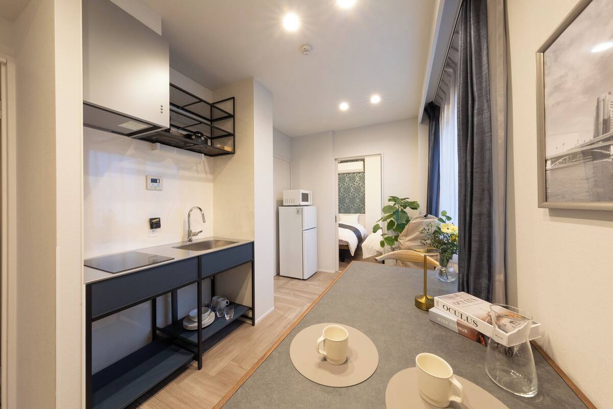 Comfort Quadruple Room | Private kitchen | Full-sized fridge, microwave, stovetop, electric kettle