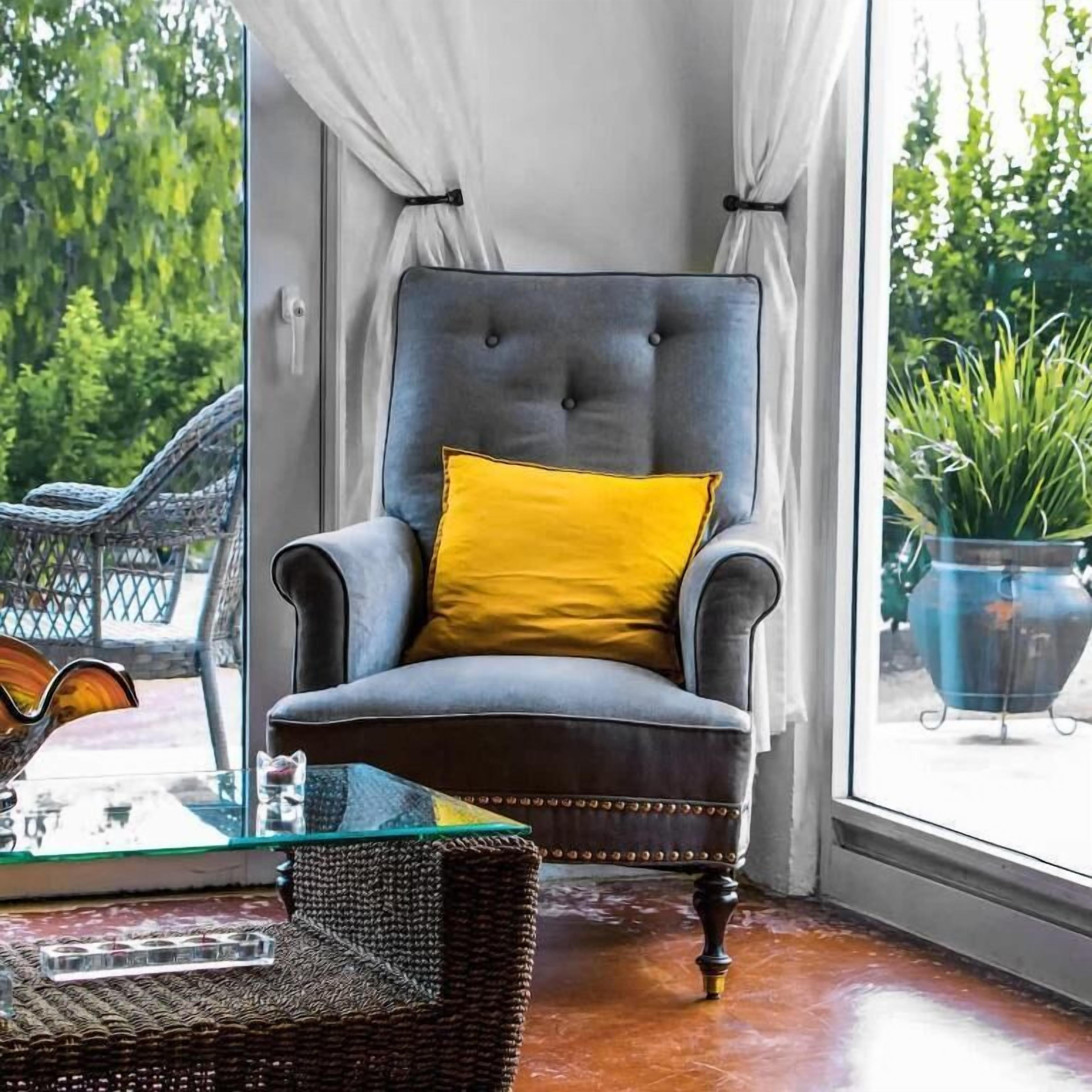 Apartamento superior, vista para o jardim | Área de estar