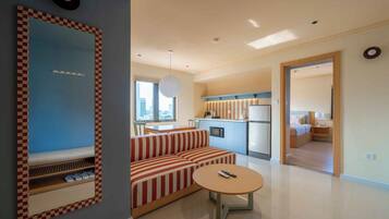 Premium Room, 1 King Bed, Kitchen, City View | In-room safe, desk, laptop workspace, iron/ironing board