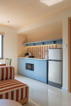Premium Room, 1 King Bed, Kitchen, City View | In-room safe, desk, laptop workspace, iron/ironing board - AVA Senses Hotel (Da Nang)