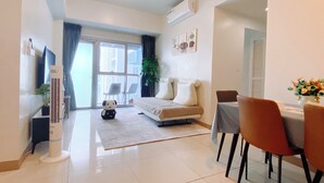 デラックス アパートメント ベイビュー | リビング エリア | 47 インチのLED テレビ (デジタル放送視聴可)