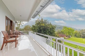 Basic Suite, Balcony | Property grounds - DWM Mandhasativa Homestay By Reccoma (Sawan)