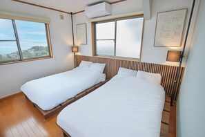 2 habitaciones, tabla de planchar con plancha y internet 