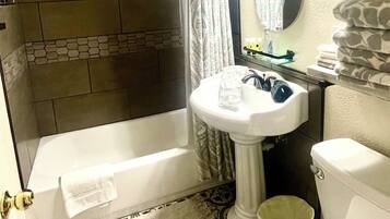 Hair dryer, towels, soap, shampoo
