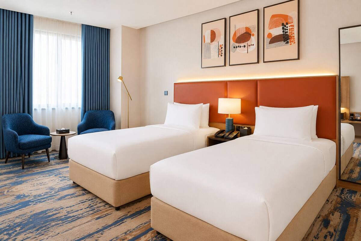 Premium bedding, pillow-top beds, in-room safe, laptop workspace