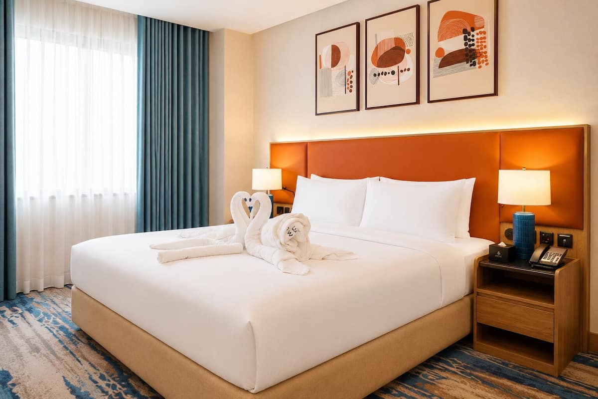 Premium bedding, pillow-top beds, in-room safe, laptop workspace