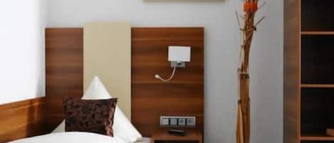 Desk, blackout drapes, soundproofing, iron/ironing board (on request)