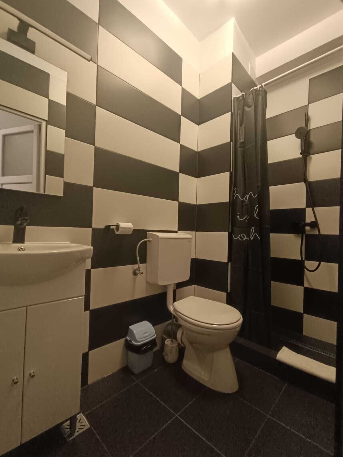 Shower, hair dryer, towels, shampoo