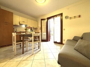 Apartment, 1 Bedroom, Patio, Garden View | Dining room - Flat in Seafront Residence With Pool (Rosolina)