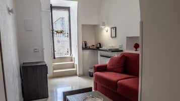 Habitación Deluxe doble, balcón, vistas a la ciudad | Zona de estar