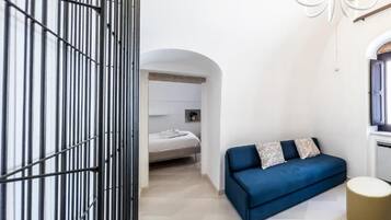 Habitación cuádruple Deluxe, balcón, vistas a la ciudad