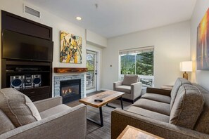 TV, fireplace, DVD player, table football - 2BR Fireplace, Hot Tub & Sauna, Ski Shuttle (Steamboat Springs)