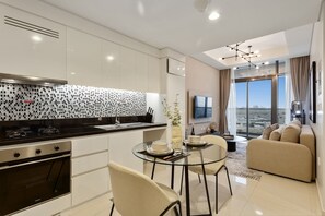 Fridge, microwave, oven, stovetop - Tranquil 1Bedroom Living in Aykon Tower (Dubai)