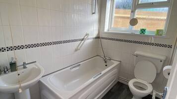 Hair dryer, towels, soap, shampoo