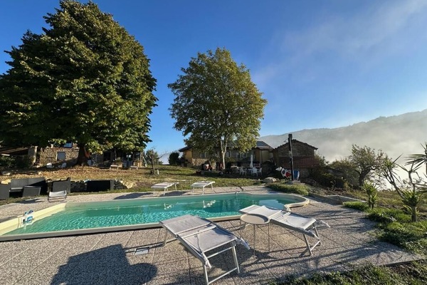 Seasonal outdoor pool, pool loungers