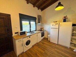 Apartment, Garden View | Private kitchen - Apartamentos los Manzanos (Ribadesella)