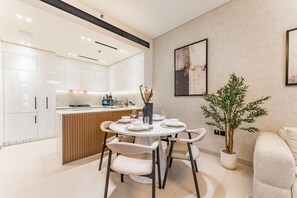 Dining - Sky-High 1BR with Community View, Just a Stone’s Throw from the Mall and Parks (Dubai)