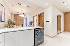 Interior - Sky-High 1BR with Community View, Just a Stone’s Throw from the Mall and Parks (Dubai)