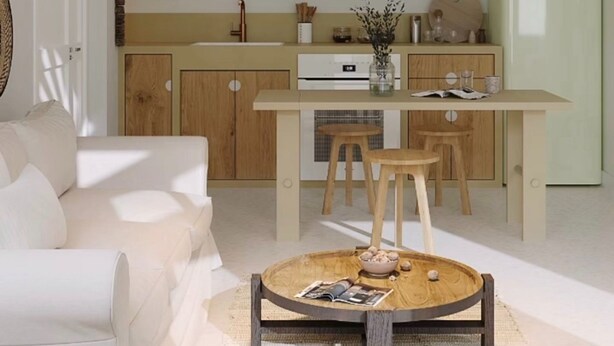 A modern kitchen with a dining area, a hanging light fixture, and a refrigerator. - Veggera Living Tinos (Tinos)