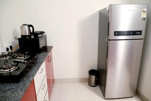 Apartment, Balcony, City View | Private kitchen - Fortune Home Service Apartment E-28 1B  (New Delhi)